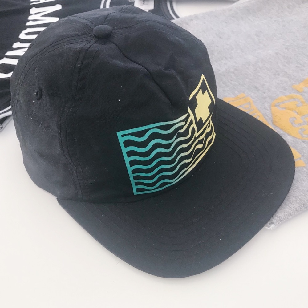 Pink Dolphin Black Hat with Blue and Yellow Design